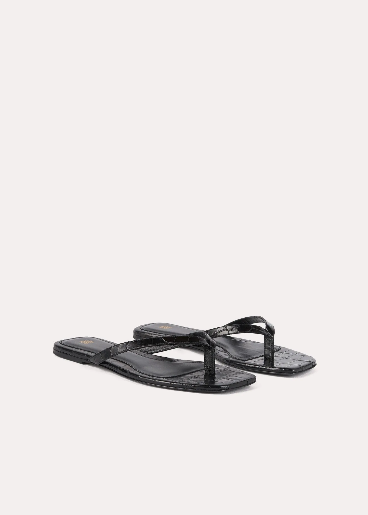 Croco-embossed flip flops black